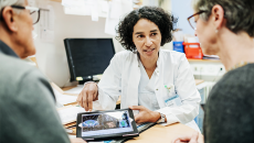 Doctor talking to patients.